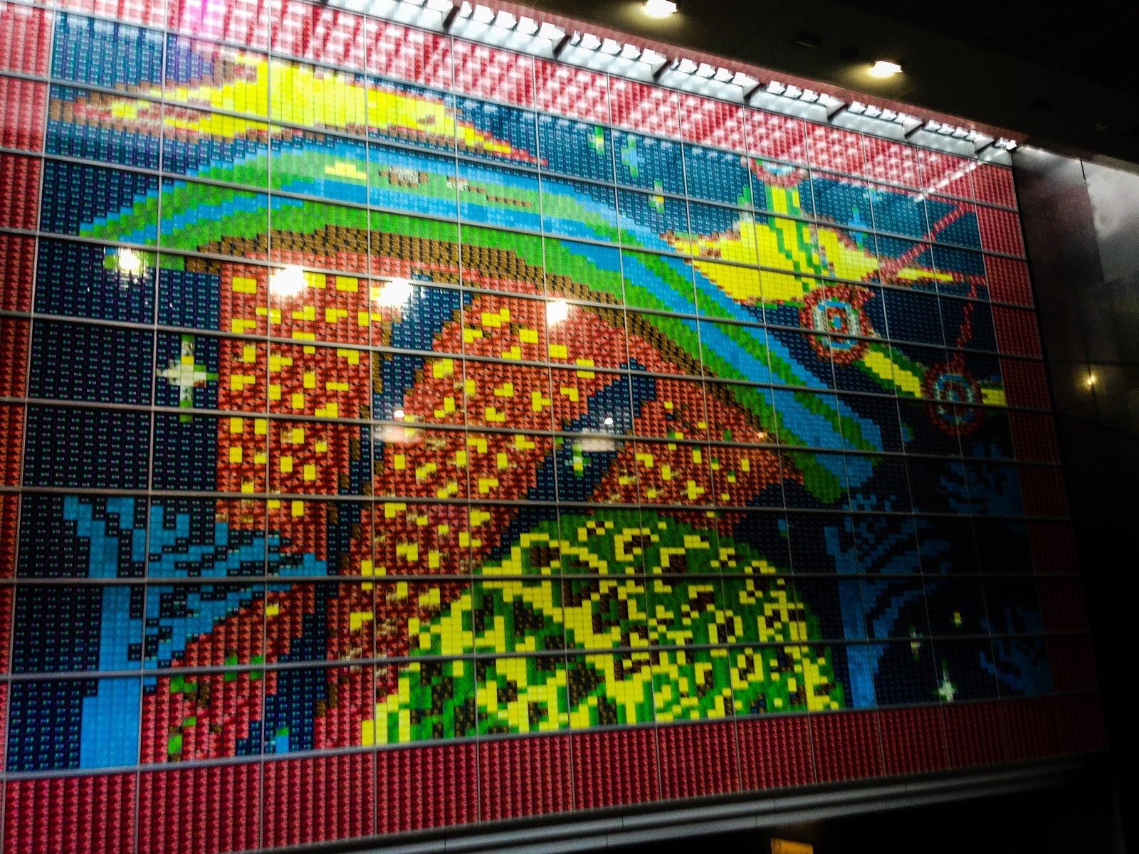 A showcase of the Marina Bay landscape featuring Marina Bay Sands, located inside the station.